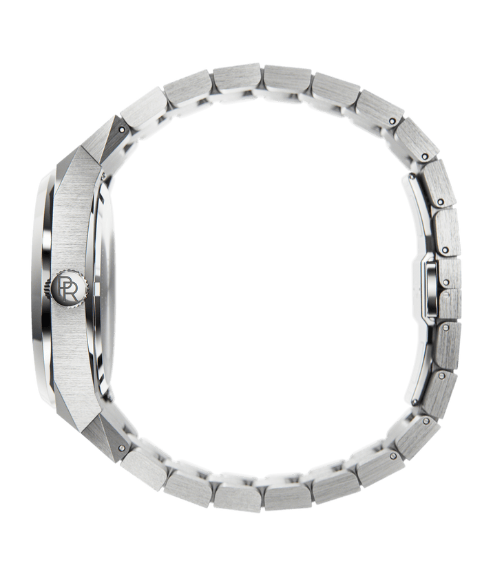 Side view of Paul Rich brushed silver stainless steel watch with PR monogram crown and full link bracelet, on transparent background.