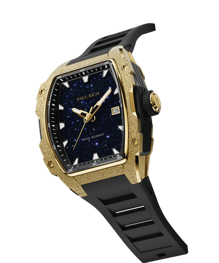 Angled view of Paul Rich watch with blue aventurine dial, gold frosted bezel, PR monogram crown, and black rubber strap.