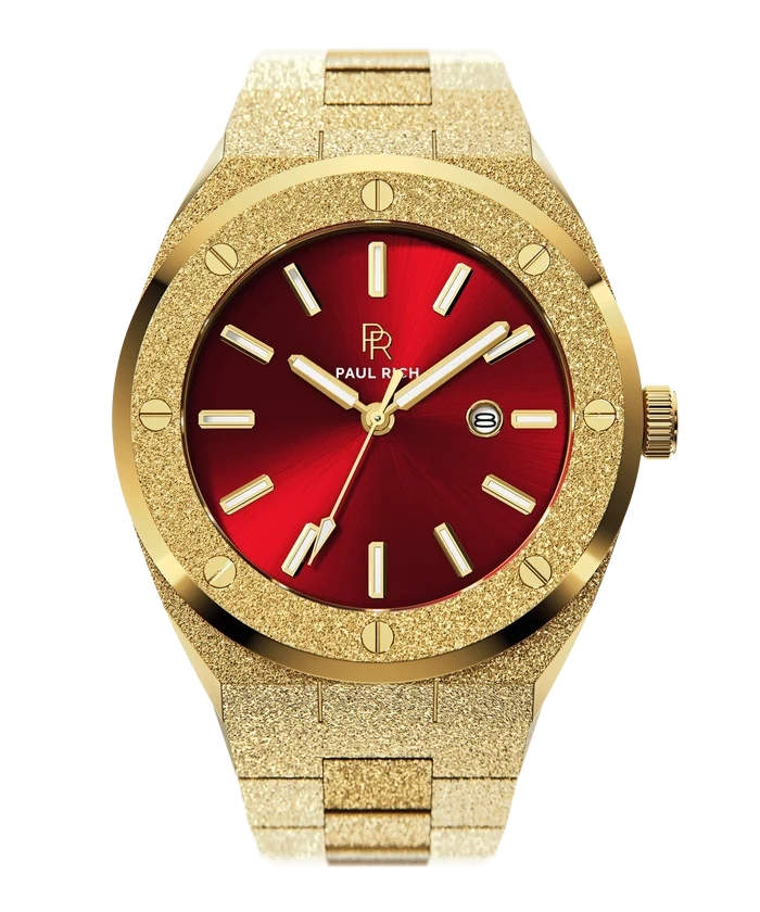 Paul Rich watch with round frosted gold case and bracelet, metallic red sunray dial, gold hour markers, and date window, shown on transparent background.