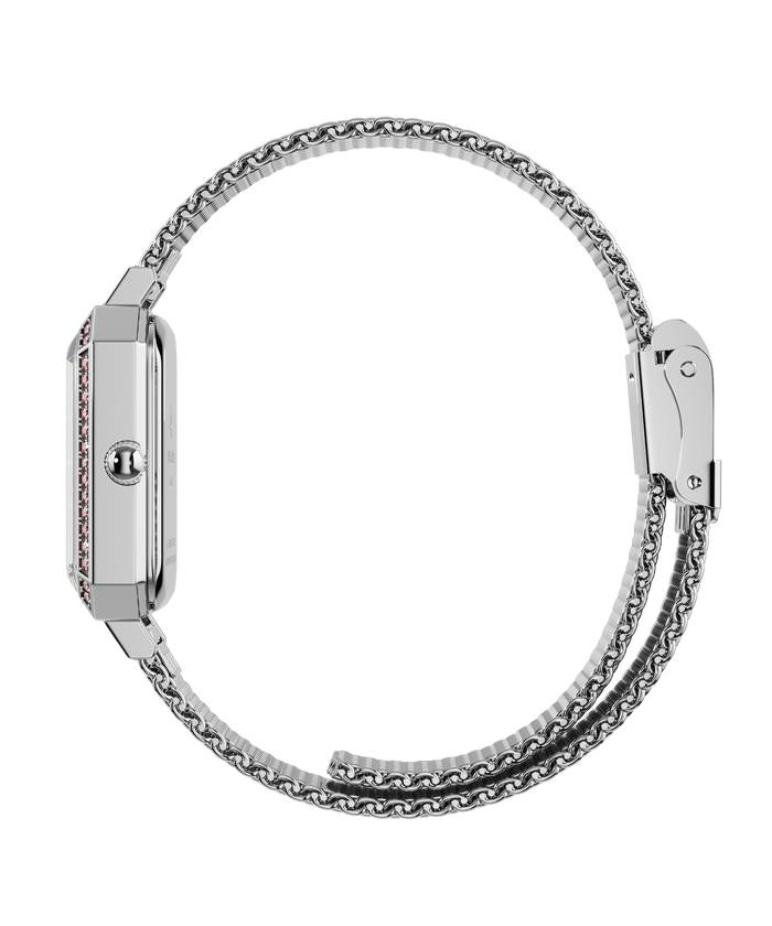 Side view of a silver-tone Paul Rich watch with a gem-set octagonal case and fully closed silver mesh strap, shown in a circular position.