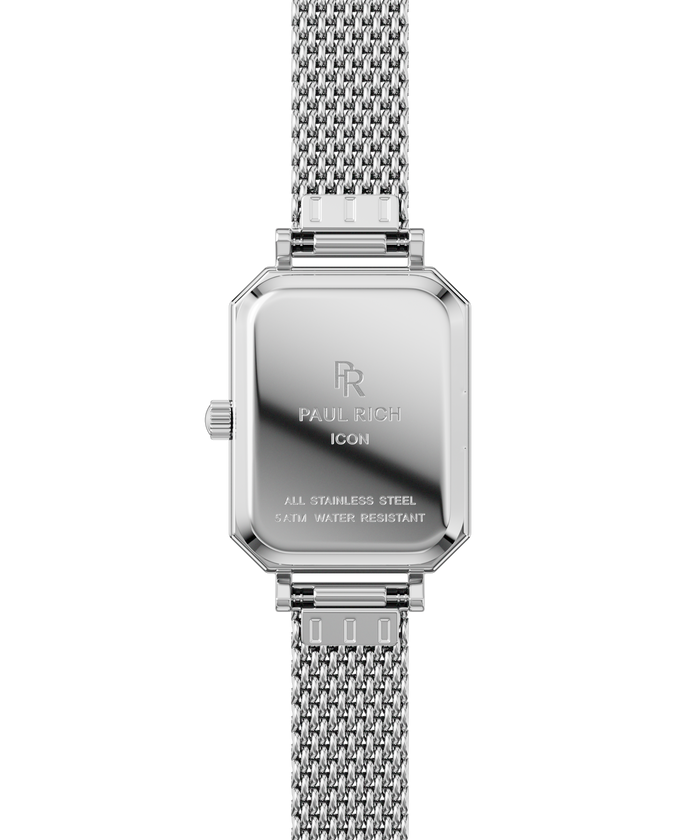Back view of a silver-tone Paul Rich watch with rectangular case engraved with “Paul Rich ICON,” “All Stainless Steel,” and “5ATM Water Resistant,” shown with a silver mesh strap.