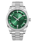 Silver watch with a green sunburst dial, date window at six o’clock, crystal-set bezel, and metal link bracelet.