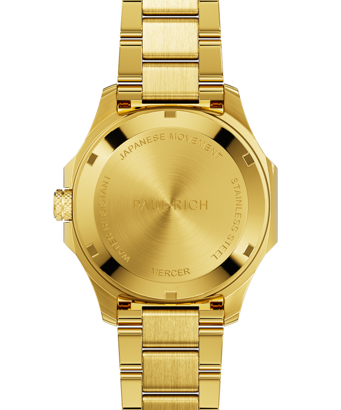Back view of Paul Rich watch with brushed gold caseback engraved with “PAUL RICH,” “MERCER,” “JAPANESE MOVEMENT,” and “STAINLESS STEEL.”