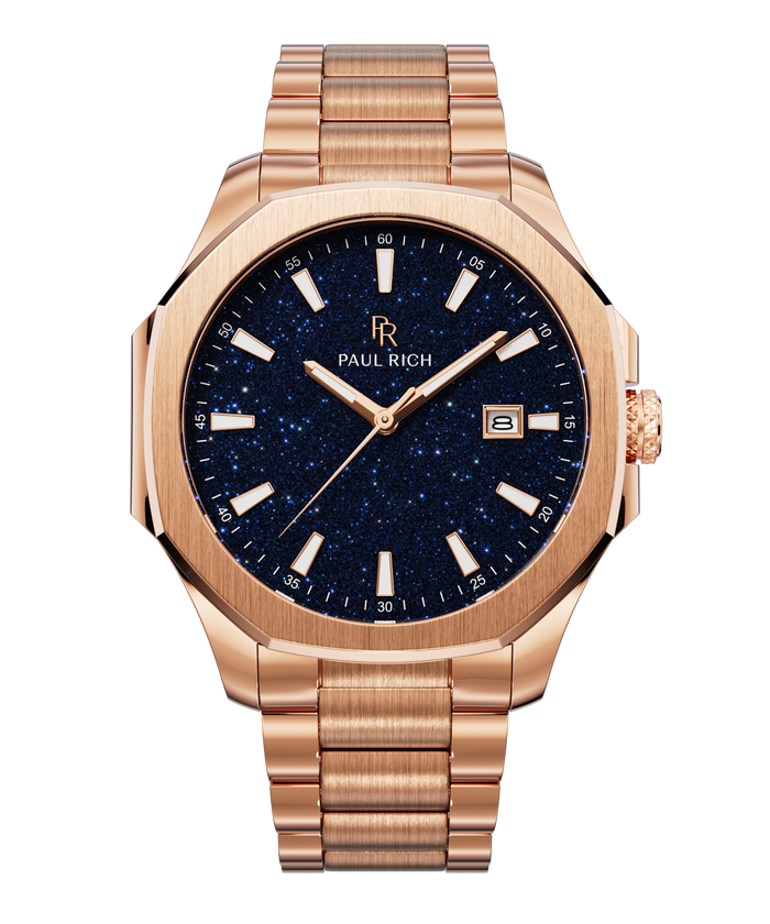 Front view of Paul Rich watch with brushed rose gold case and bracelet, blue aventurine dial, rose gold indices, and date window at 3 o’clock.