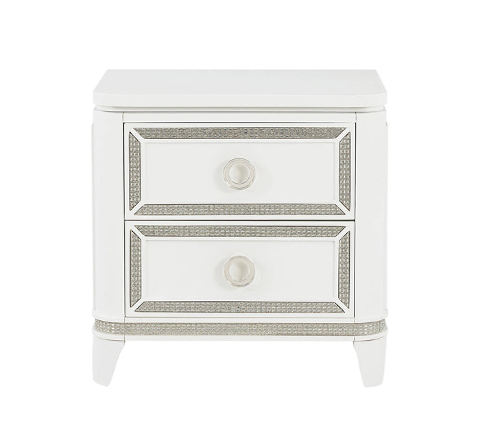 White nightstand with decorative trim and two drawers on a white background